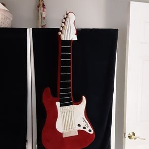 Rocker stuffed guitar pillow